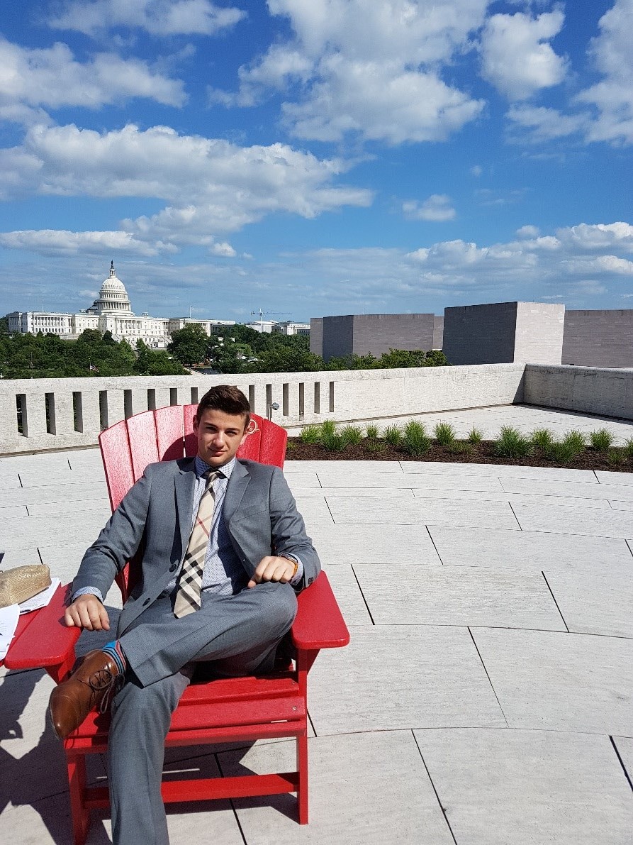 Lucas Sitting at Washington