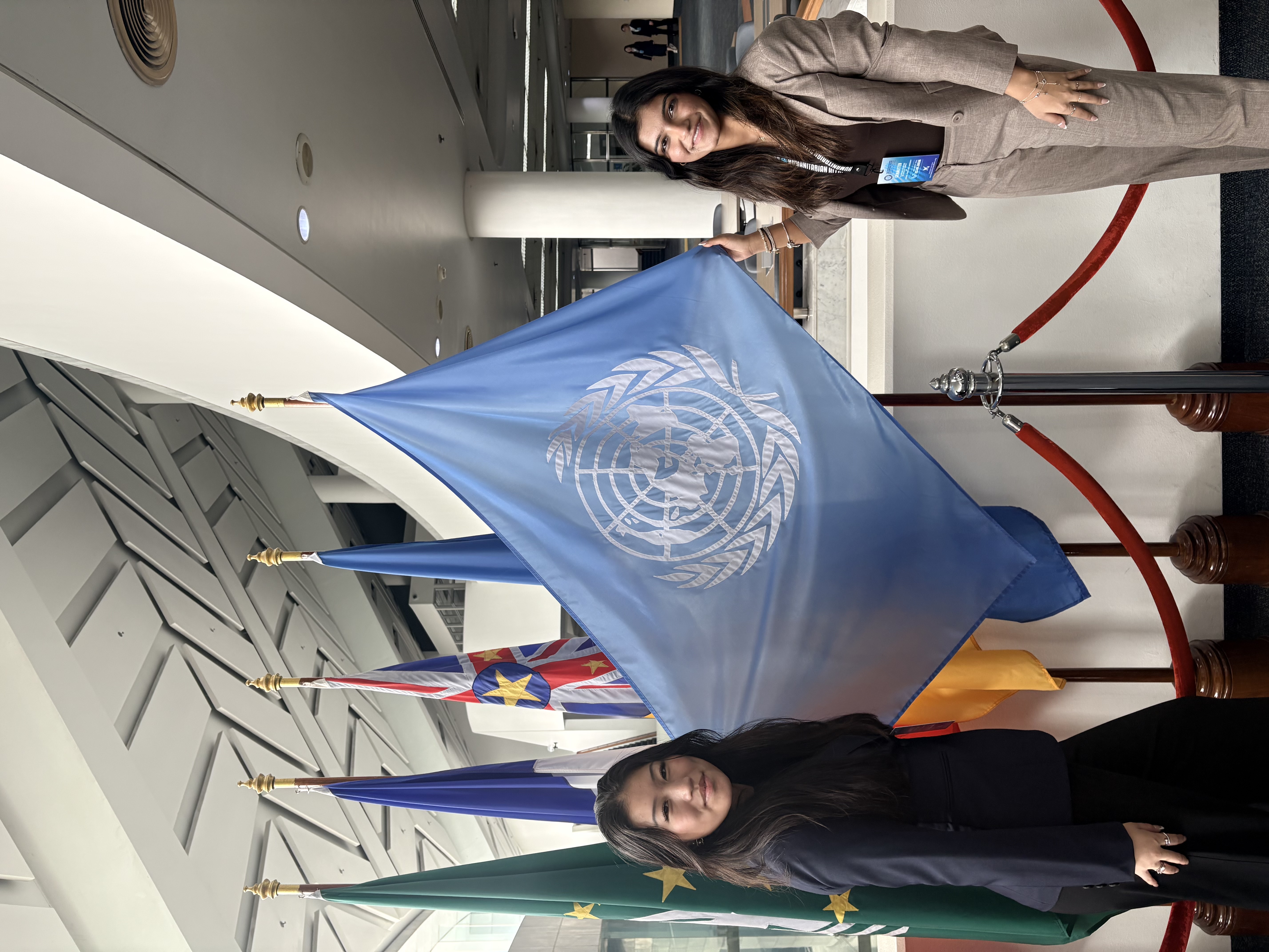 Sanesha and Angelina with some flags